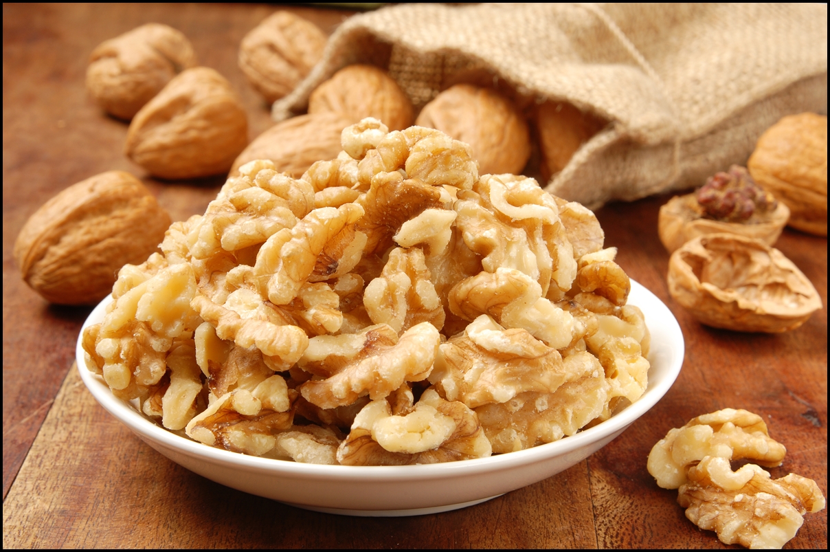 Delicious walnut kernel in a white bowl